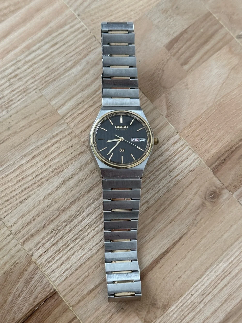 Seiko SQ Vintage Watch Gold Plated Bezel and Bracelet Black Dial Date Window